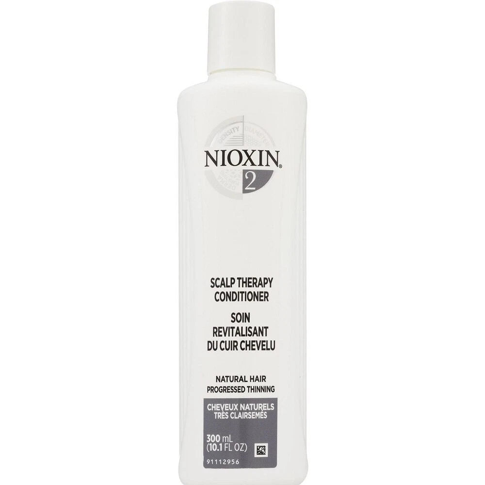A 300 mL white plastic bottle of Nioxin 2 Scalp Therapy Conditioner with black and gray text, shown against a plain white background.