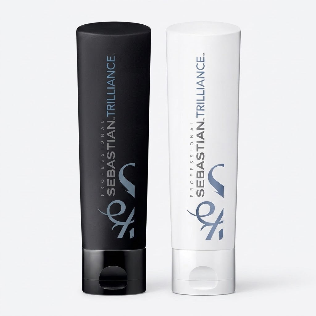 Two cosmetic squeeze tubes from Sebastian Trilliance standing upright on a light gray background. 