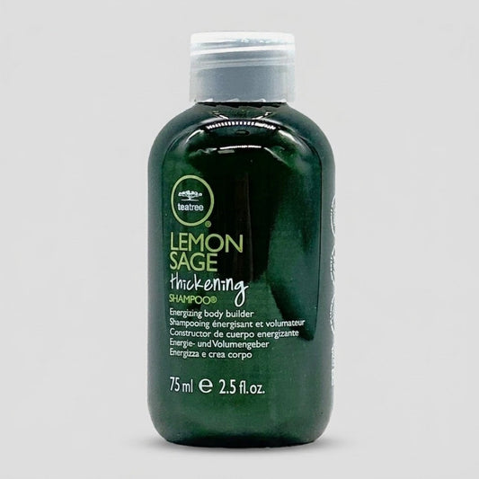 A 75 ml bottle of Tea Tree Lemon Sage Thickening Shampoo in a dark green translucent plastic bottle with a white cap, shown against a light gray background.