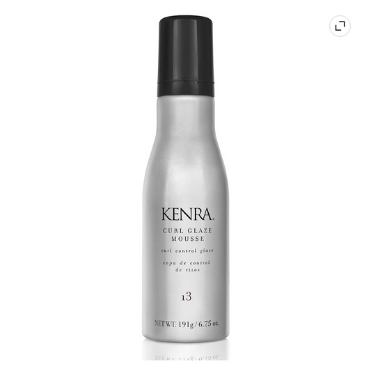 A bottle of Kenra Curl Glaze Mousse in shade 13, featuring a metallic silver body and a black cap, set against a plain white background.