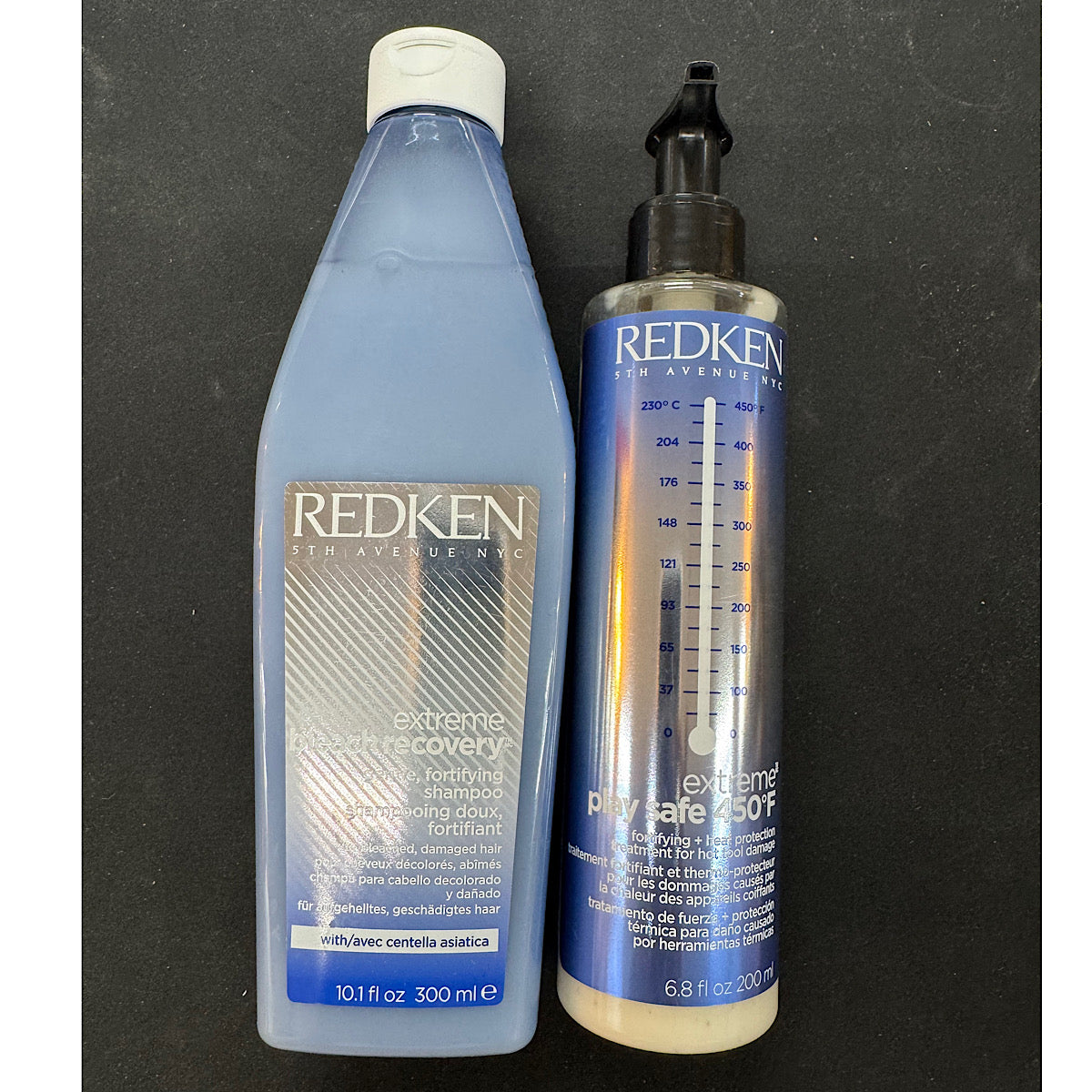 A 12.1 fl oz bottle of Redken Extreme Hair Straightener and a 6.