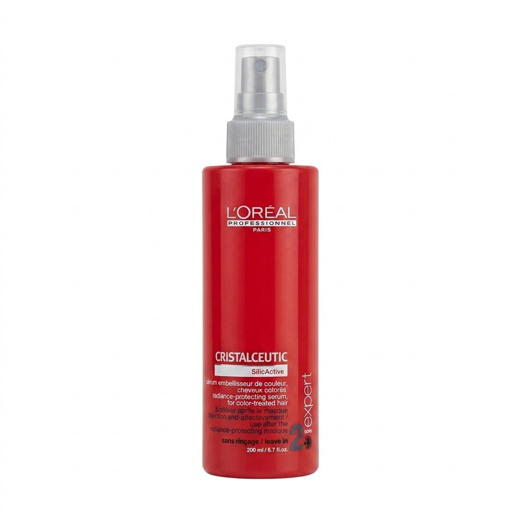 L'Oréal Professionnel Crystalléutic SilkActive hair spray in a red plastic bottle with a silver spray nozzle, shown on a plain white background.