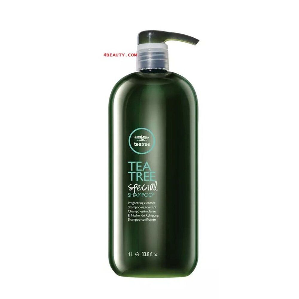 A 1L bottle of Tea Tree Special Shampoo by Teatreco, featuring a dark green translucent bottle and a black pump dispenser, set against a plain white background.