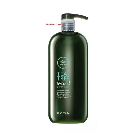 A 1L bottle of Tea Tree Special Shampoo by Teatreco, featuring a dark green translucent bottle and a black pump dispenser, set against a plain white background.