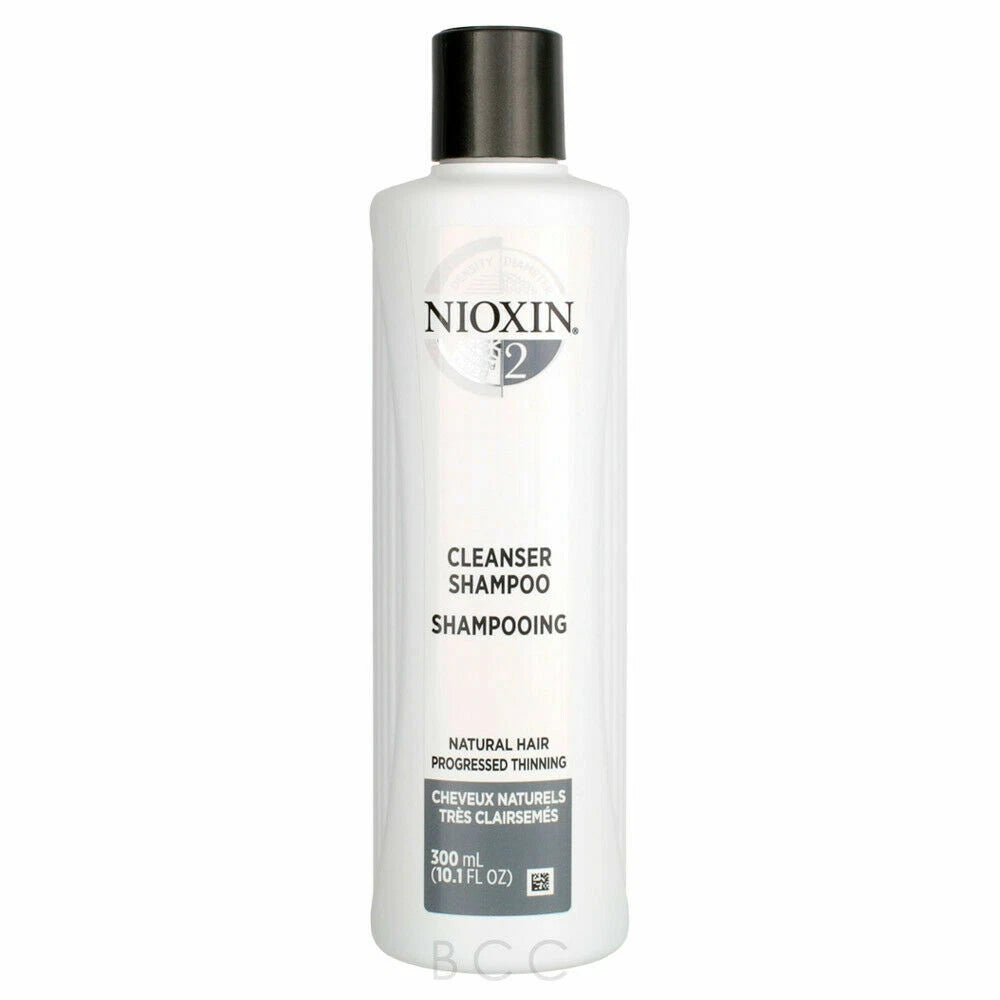 Nioxin #2 Cleanser Shampoo in a 300 ml white bottle with a black cap, shown against a plain white background.
