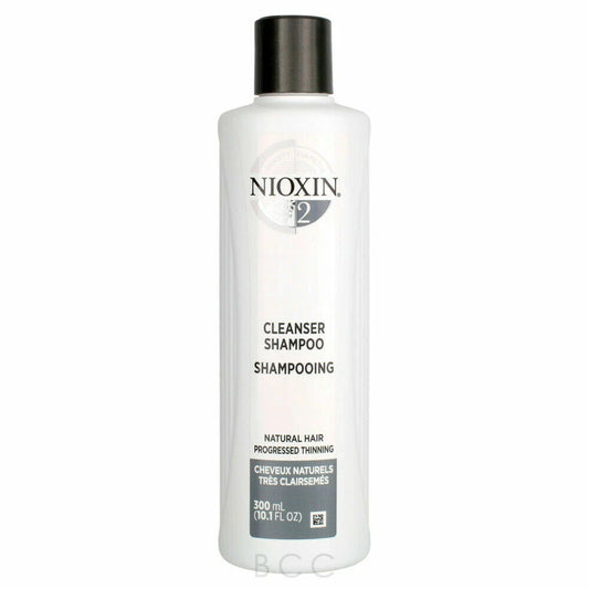 Nioxin #2 Cleanser Shampoo in a 300 ml white bottle with a black cap, shown against a plain white background.