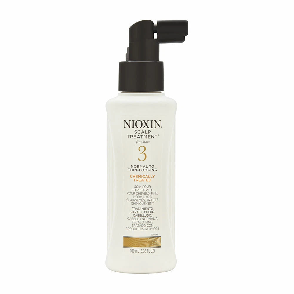 Nioxin 3 Anti-aging Hair Regrowth Shampoo in a white pump bottle with a black dispenser and gold accents, on a white background.